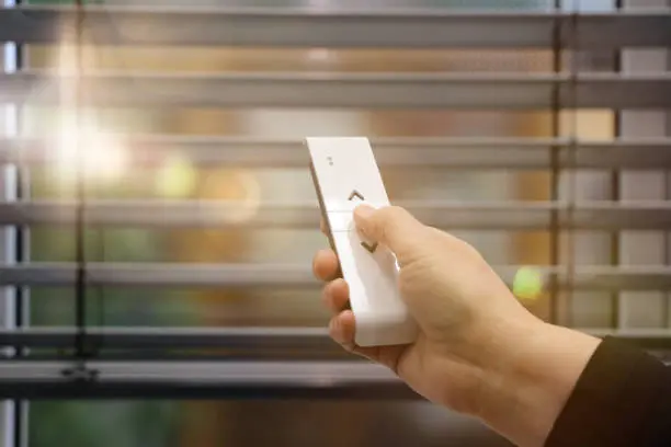 Remote control operating motorized blinds